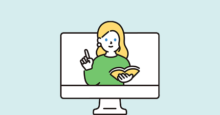 パソコン画面で教える金髪の女性