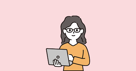 パソコンをもっているインテリ女性